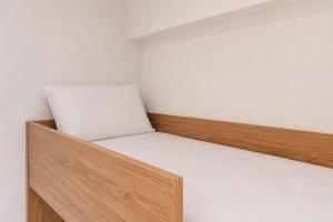 Combined and Spacious 3BR at Green Pramuka City Apartment By Travelio