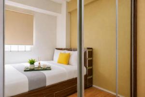 Combined and Spacious 3BR at Green Pramuka City Apartment By Travelio