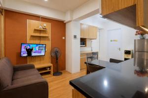 Combined and Spacious 3BR at Green Pramuka City Apartment By Travelio