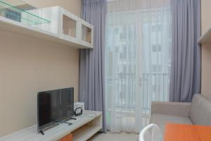 Comfortable 1BR at Signature Park Grande near Cawang Station Apartment By Travelio