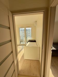 A modern apartment with air conditioning and a balcony