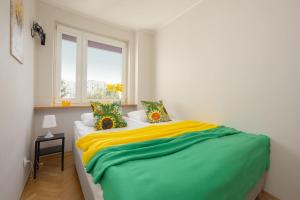 Practical Family Apartment with 2 Bedrooms a Few Minutes From the Airport by Noclegi Renters