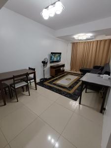 Spacious living room & big balcony - Pool View