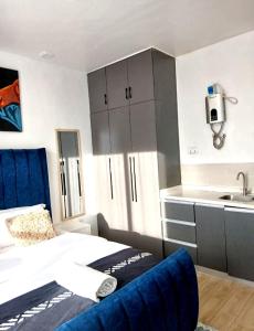Kalayi Homes Studio apartment near JKIA, SGR, Pool, Gym and fast WiFi