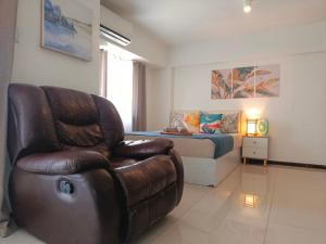 Affordable Travellers Studio Condo near Mactan Airport by A&C