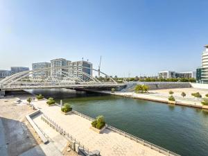 Amazing 1BR Canal View Raha Beach