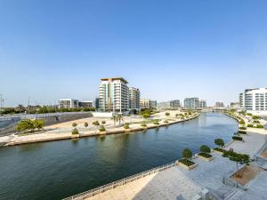Amazing 1BR Canal View Raha Beach