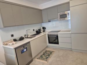 Lumos Town Residence-Cozy Suite near Mall & Beach