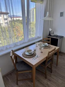 Tichý priestranný apartmán s parkovaním