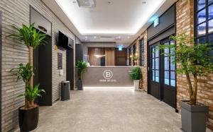 Brown Dot Hotel Guun