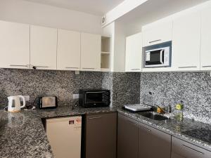 Studio con amenities zona Hospital Italiamo 36
