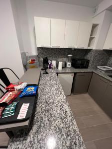 Studio con amenities zona Hospital Italiamo 11