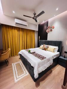 BohoLuxe Modern Luxury Apartment with Balcony Near Gaur City Mall
