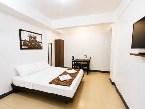 Metrohive Apartment - Cozy Studio Near NAIA Airport & PITX