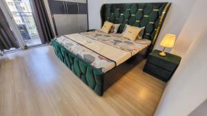 VacationBuddy Premium 3 BHK High-Rise City Views in DLF Capital Greens