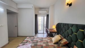 VacationBuddy Premium 3 BHK High-Rise City Views in DLF Capital Greens