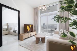 Vogue Vacation Homes, Arjan Skyz by Danube near Miracle Garden, One Bedroom Apartment with Balcony, Community and Dubai Outdoor Kart drome View, Access toAmenities