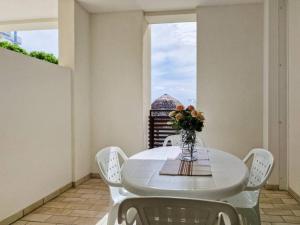 Relaxing apartment with terrace and pool in Bibione