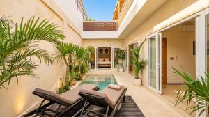 Sea-view rooftop & pool · 5min to ocean · 2 BR