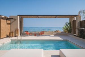 Iris Beachfront Residence, Coastal City Living, By ThinkVilla