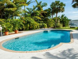 Waterfront Cottage Rental with a Heated Pool on the Indian River in Florida