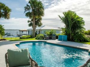 Waterfront Cottage Rental with a Heated Pool on the Indian River in Florida