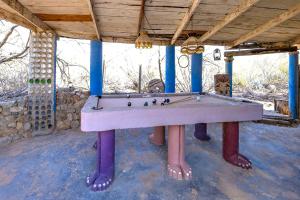 Artistic Earth House with Vibrant Glass Bottle Architecture Near Saguaro National Park in Tucson, Arizona