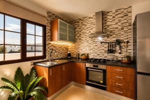 Casa Carla Lanzarote - terraza, BBQ y jardín volcánico