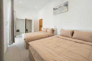 Calm house. 2BR. 10 min drive to the beach