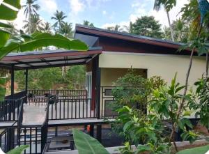 Relax and Recharge in a Spacious Jungle House