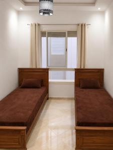 Elegant Pool-View Apartment with Private Balcony