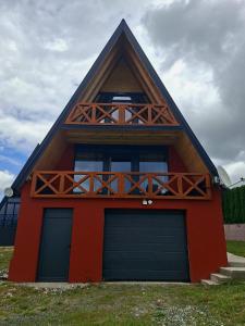 Cigota Hills Red & Black Chalets