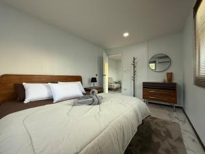 Stylish 2BR Bungalow with AC and 3 Minute Beach Walk