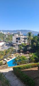 Departamento Familiar con alberca, Aire Acondicionado y cerca de Papagayo