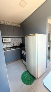 Kitnet Moderna com Ar, Wi-Fi e Garagem