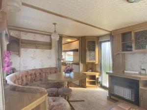 Vintage Stacaravan nabij de zee