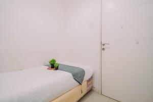 Exquisite 2BR Bassura City Apartment near Shopping Mall By Travelio