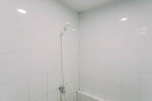 Exquisite 2BR Bassura City Apartment near Shopping Mall By Travelio