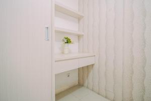 Exquisite 2BR Bassura City Apartment near Shopping Mall By Travelio