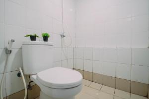 Exquisite 2BR Bassura City Apartment near Shopping Mall By Travelio