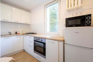 Komfortowy Apartament z Balkonem Blisko ERGO ARENA by Noclegi Renters