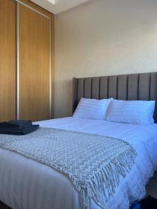 Appartement avec piscine en bord de mer