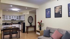 2BR Condo w free parking near SM North