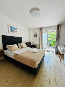 Pokoje i apartamenty Ula z pięknym ogrodem i śniadaniami