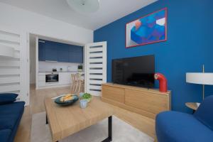 Browary Warszawskie Apartment with Air Conditioning and Parking by Noclegi Renters