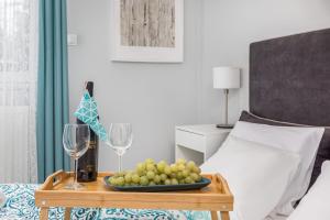 Stylowy Apartament z Balkonem Blisko Plaży by Noclegi Renters