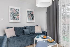 Stylowy Apartament z Balkonem Blisko Plaży by Noclegi Renters