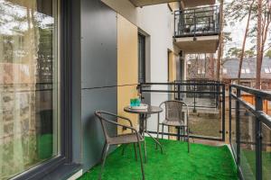 Stylowy Apartament z Balkonem Blisko Plaży by Noclegi Renters