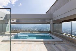 24th Floor Skyline Views in Poblado with AC and Fast WiFi