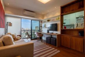 Flat com varanda, vista mar e Cristo
